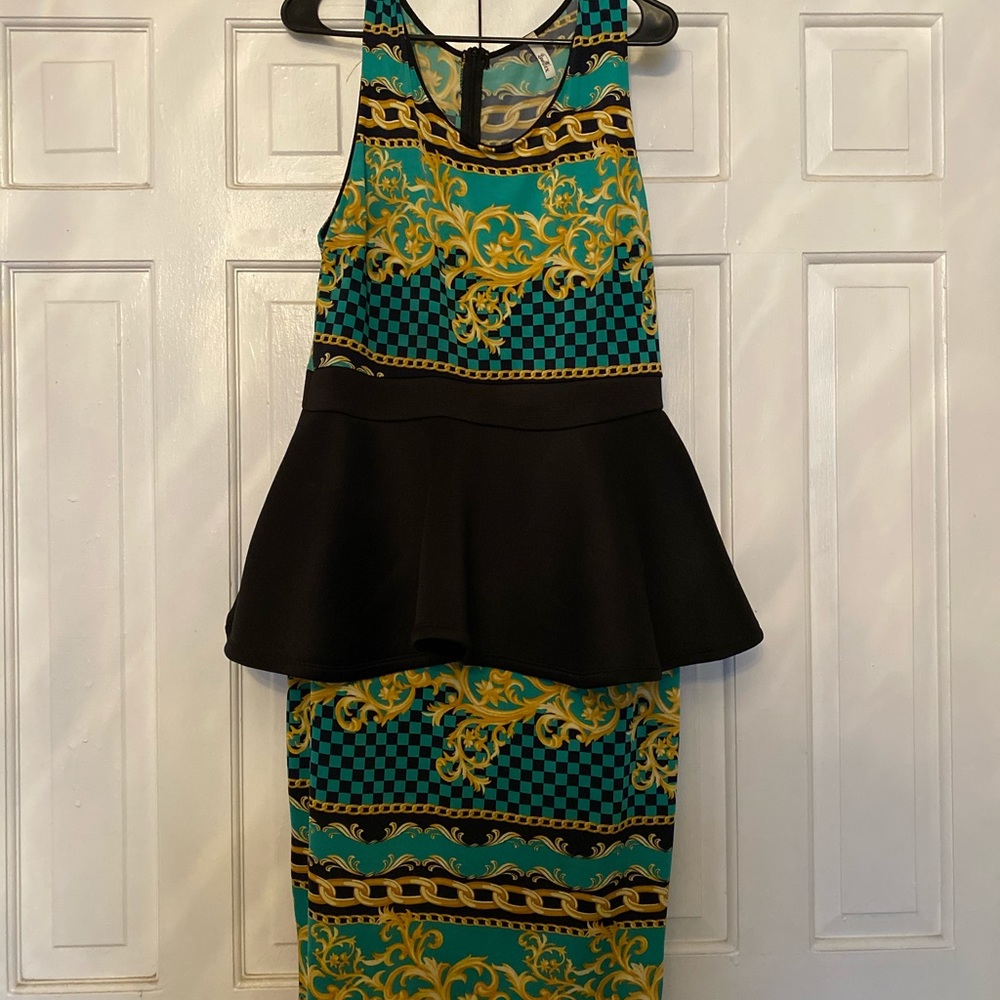 Green peplum dress